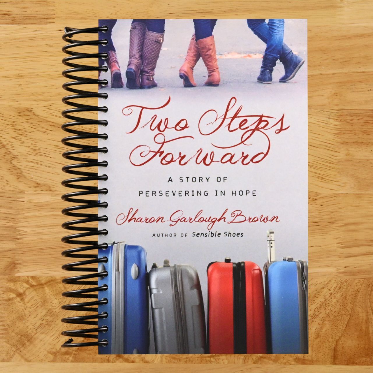 Two Steps Forward: A Story of Persevering in Hope (Sensible Shoes Series) (Spiral bound) Happy Coil spiral bound book