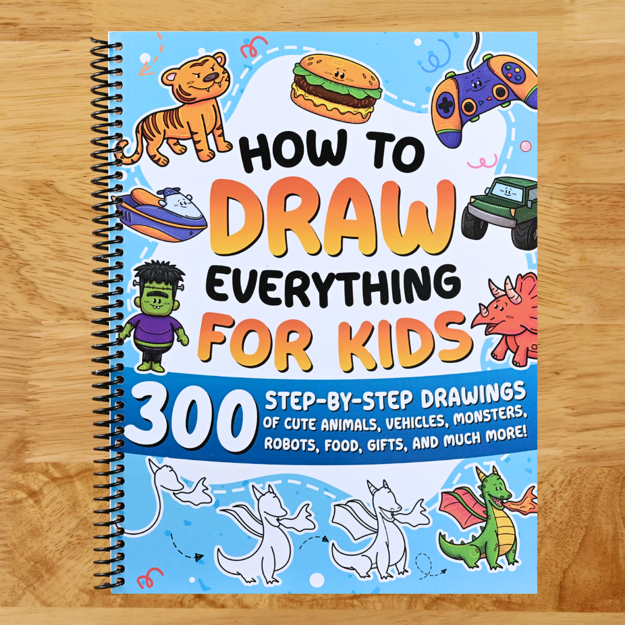 How to Draw Everything for Kids: 300 Step-by-Step Drawings of Cute Animals, Vehicles, Monsters, Robots, Food, Gifts, and Much More! (Spiral bound) Happy Coil spiral bound book