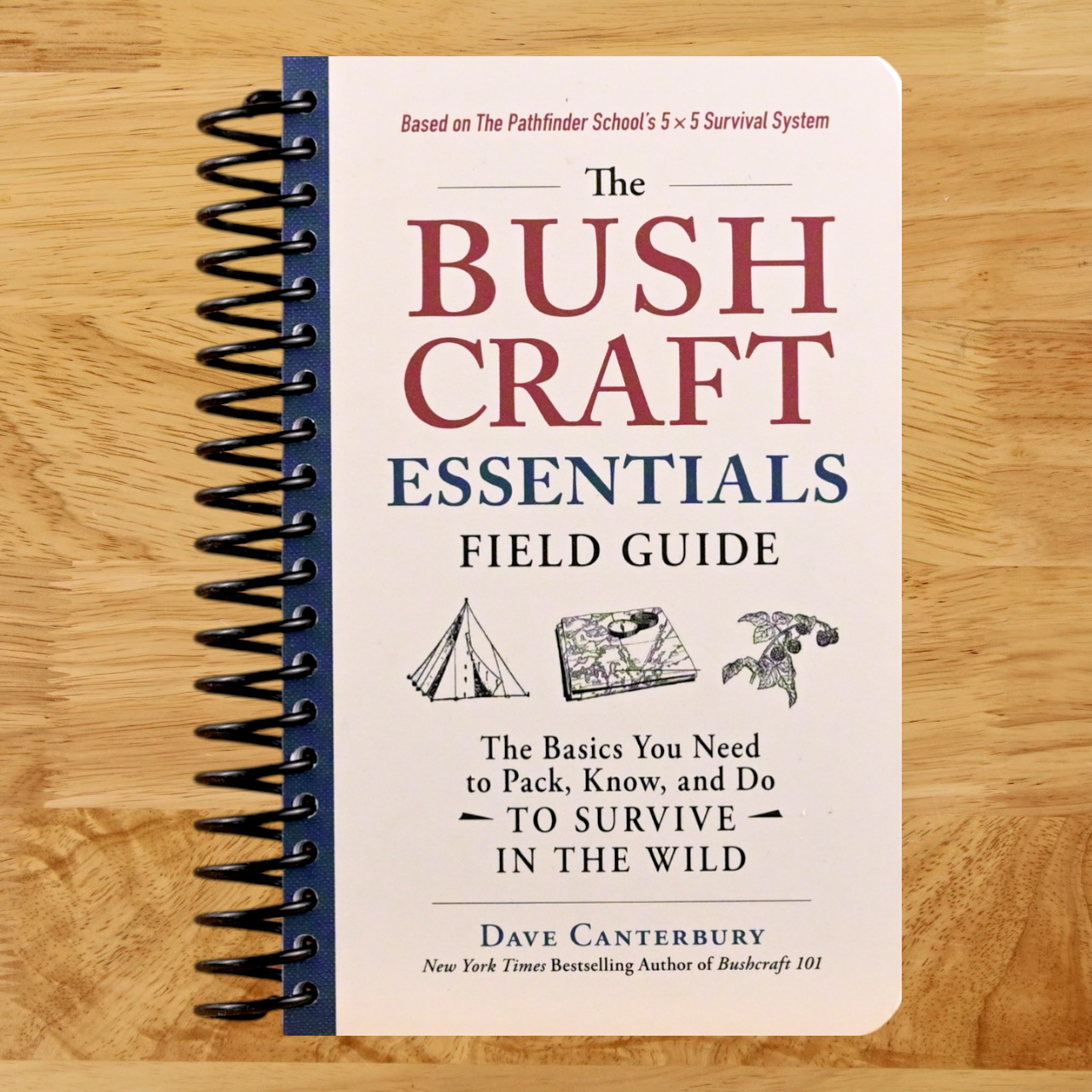 The Bushcraft Essentials Field Guide: The Basics You Need to Pack, Know, and Do to Survive in the Wild (Bushcraft Survival Skills Series) (Spiral bound) Happy Coil spiral bound book