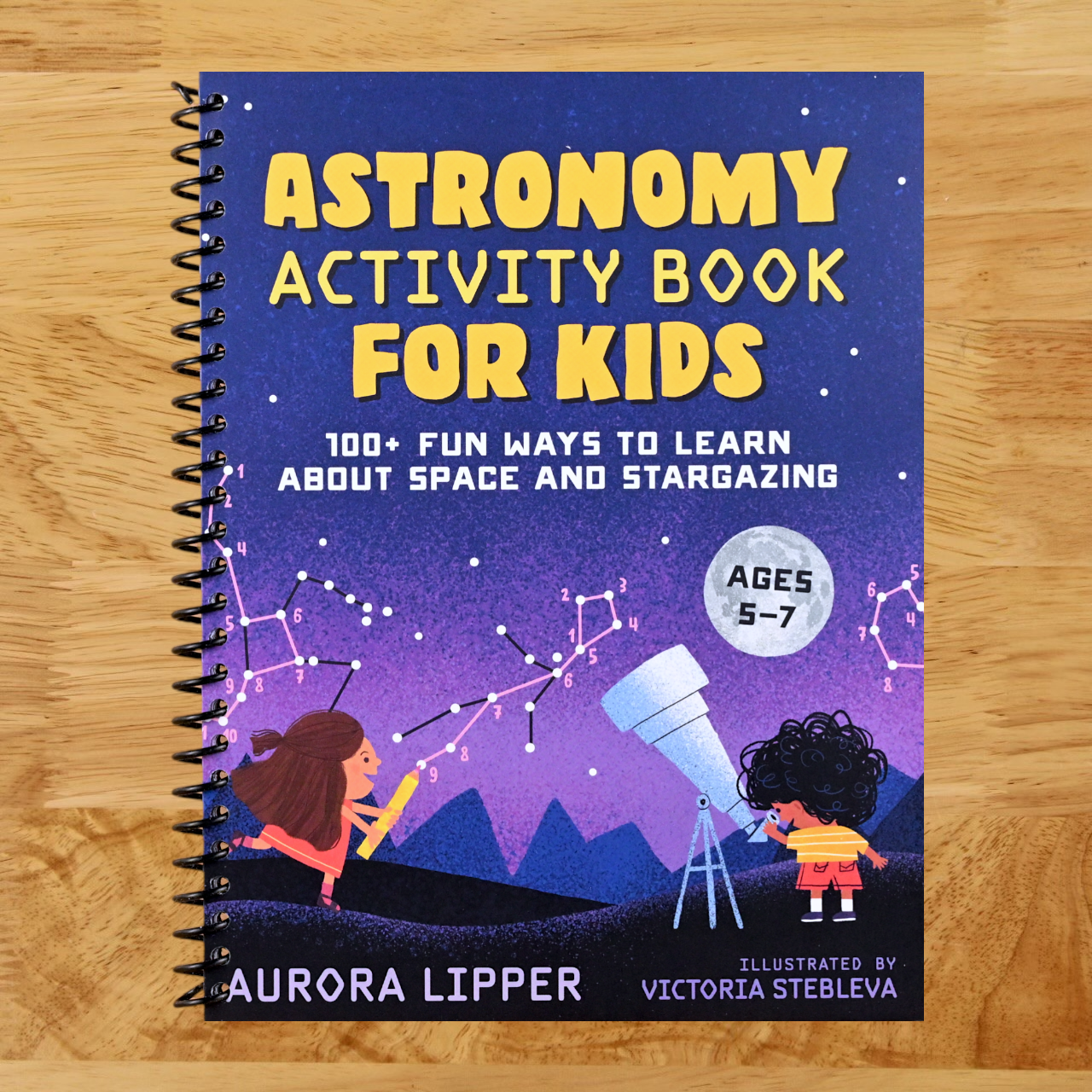 Astronomy Activity Book for Kids: 100+ Fun Ways to Learn About Space and Stargazing (Spiral bound)