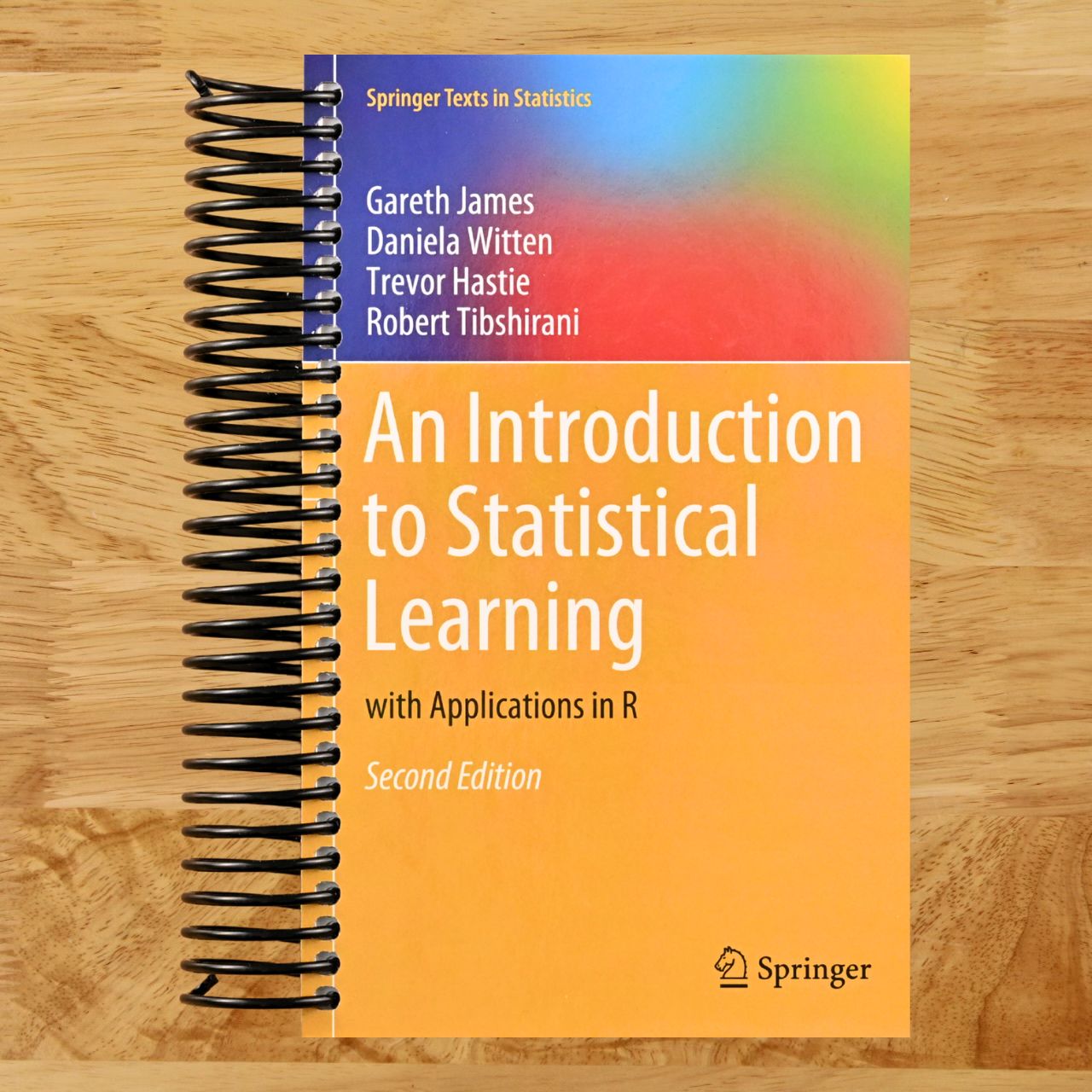 An Introduction to Statistical Learning: with Applications in R (Springer Texts in Statistics) (Spiral bound) Happy Coil spiral bound book