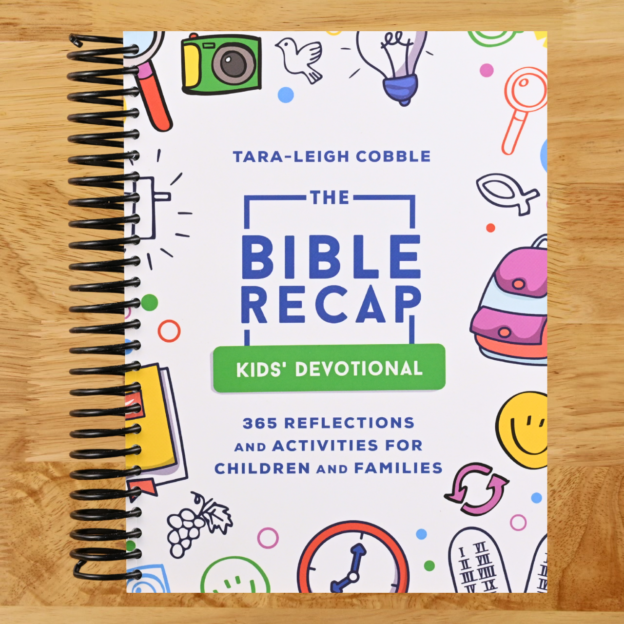 The Bible Recap Kids' Devotional: 365 Reflections and Activities for Children and Families to Read the Bible in a Year (Spiral bound) Happy Coil spiral bound book