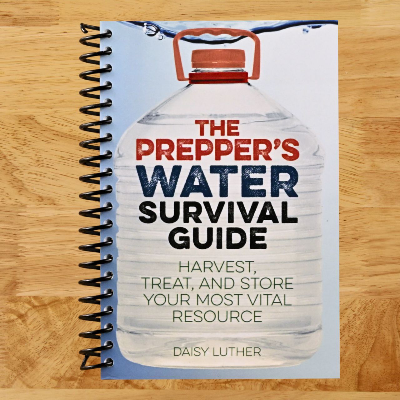 The Prepper's Water Survival Guide: Harvest, Treat, and Store Your Most Vital Resource (Spiral bound) Happy Coil spiral bound book