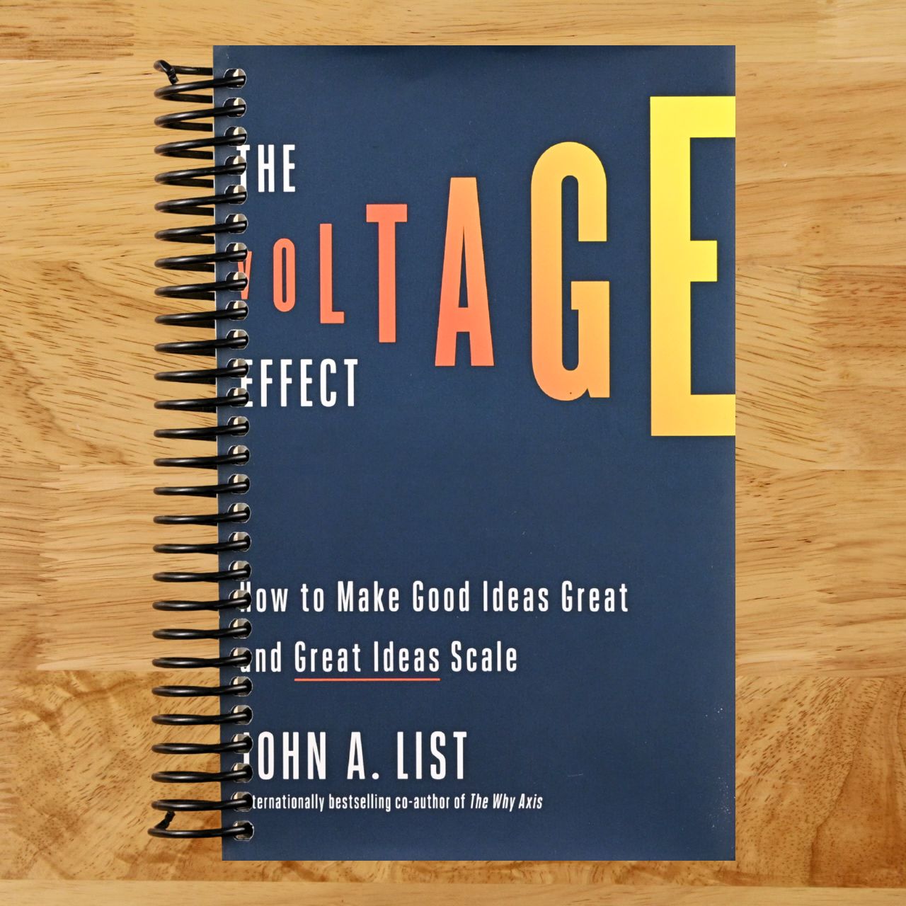 The Voltage Effect: How to Make Good Ideas Great and Great Ideas Scale (Spiral bound) Happy Coil spiral bound book
