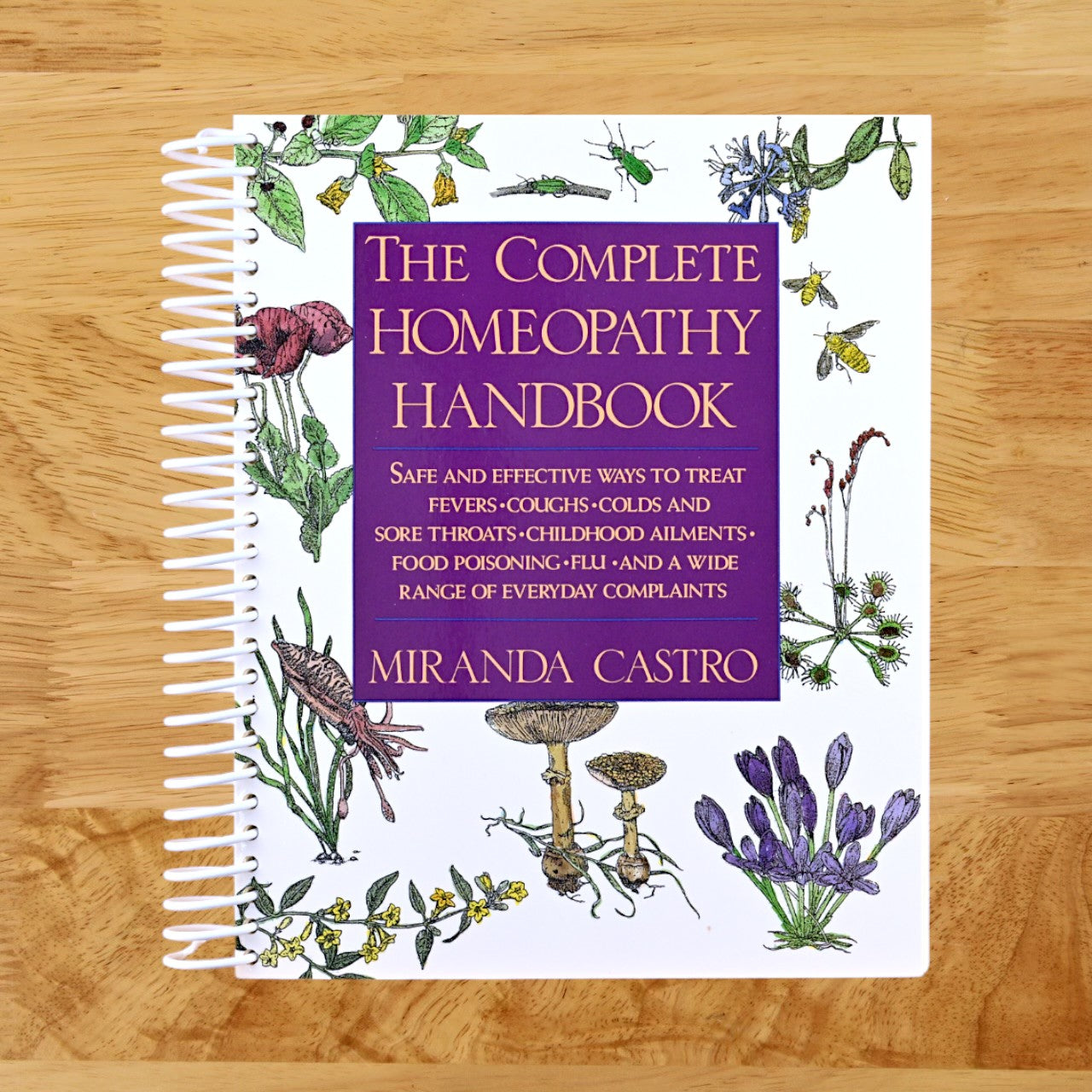 The Complete Homeopathy Handbook: Safe and Effective Ways to Treat Fevers, Coughs, Colds and Sore Throats, Childhood Ailments, Food Poisoning, Flu, and a Wide Range of Everyday Complaints (Spiral bound) Happy Coil spiral bound book