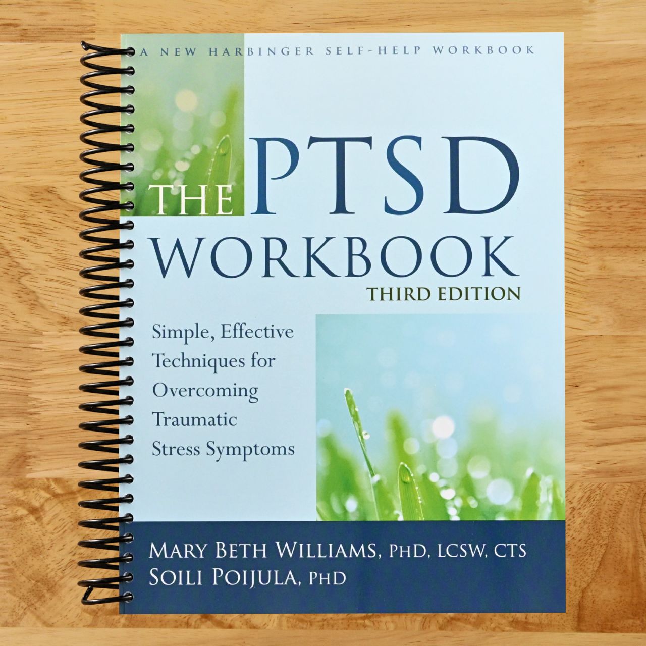 The PTSD Workbook: Simple, Effective Techniques for Overcoming Traumatic Stress Symptoms (Spiral bound) Happy Coil spiral bound book
