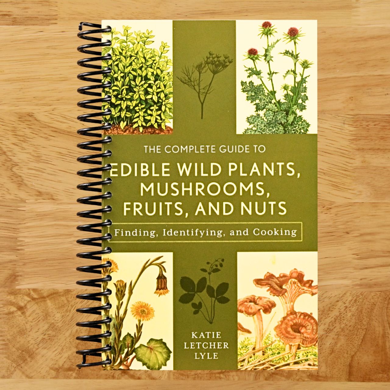 The Complete Guide to Edible Wild Plants, Mushrooms, Fruits, and Nuts (Guide to Series) (Spiral bound) Happy Coil spiral bound book