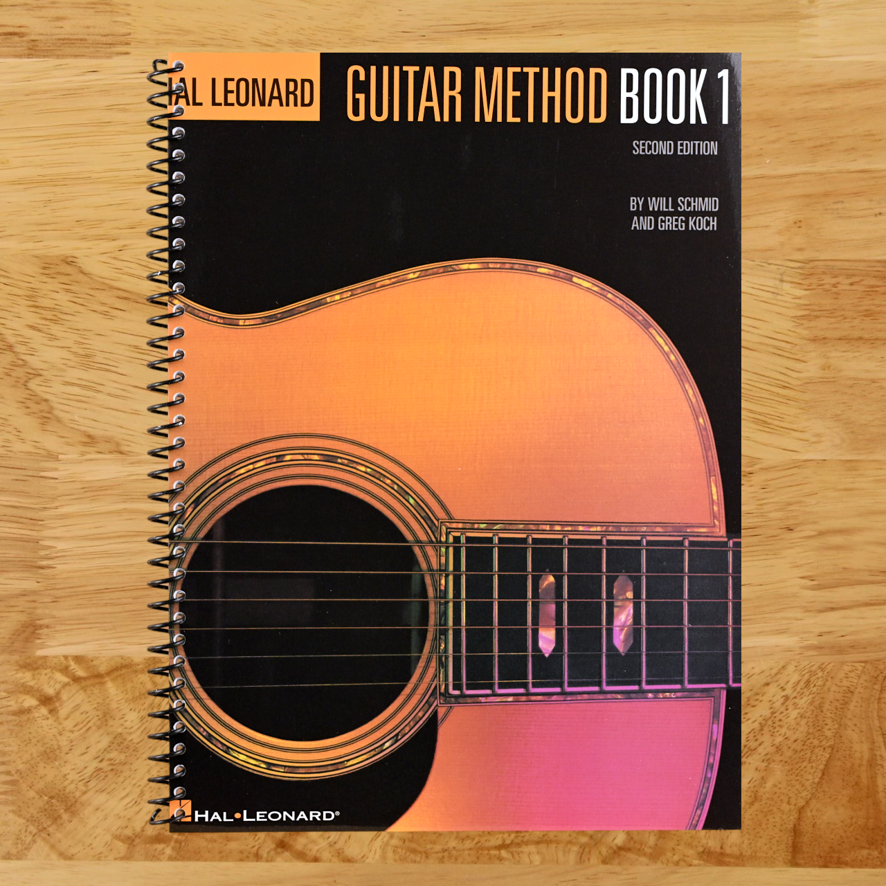 Guitar Method Book 1 by Will Schmid and Greg Koch | Hal Leonard Beginner Guitar Lesson Book for Acoustic and Electric Guitar | Step-by-Step Guitar Instruction with Chords Songs and Exercises   (Spiral bound)