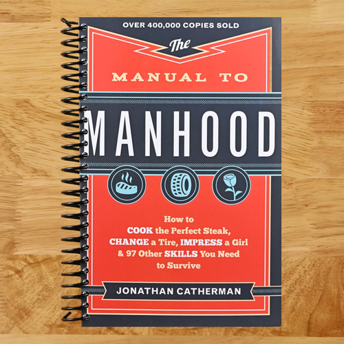 The Manual to Manhood: How to Cook the Perfect Steak, Change a Tire, Impress a Girl & 97 Other Skills You Need to Survive  (Spiral bound)