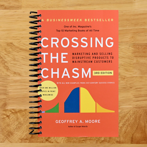 Crossing the Chasm, 3rd Edition: The Updated Version of the Insightful Guide on Bringing Cutting-Edge Products to the Mainstream (Collins Business Essentials) (Spiral bound) Happy Coil spiral bound book