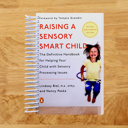 Raising a Sensory Smart Child: The Definitive Handbook for Helping Your Child with Sensory Processing Issues, Revised and Updated Edition