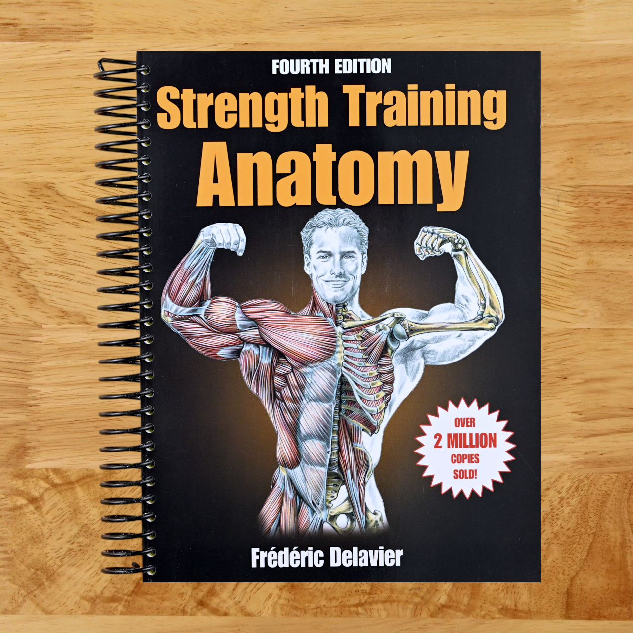 Strength Training Anatomy (Spiral bound) Happy Coil spiral bound book