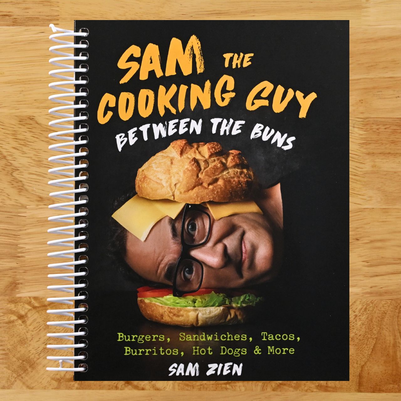 Sam the Cooking Guy: Between the Buns: Burgers, Sandwiches, Tacos, Burritos, Hot Dogs & More (Spiral bound) Happy Coil spiral bound book