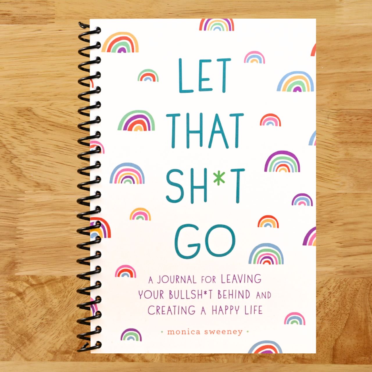 Let That Sh*t Go: A Journal for Leaving Your Bullsh*t Behind and Creating a Happy Life (Spiral bound) Happy Coil spiral bound book